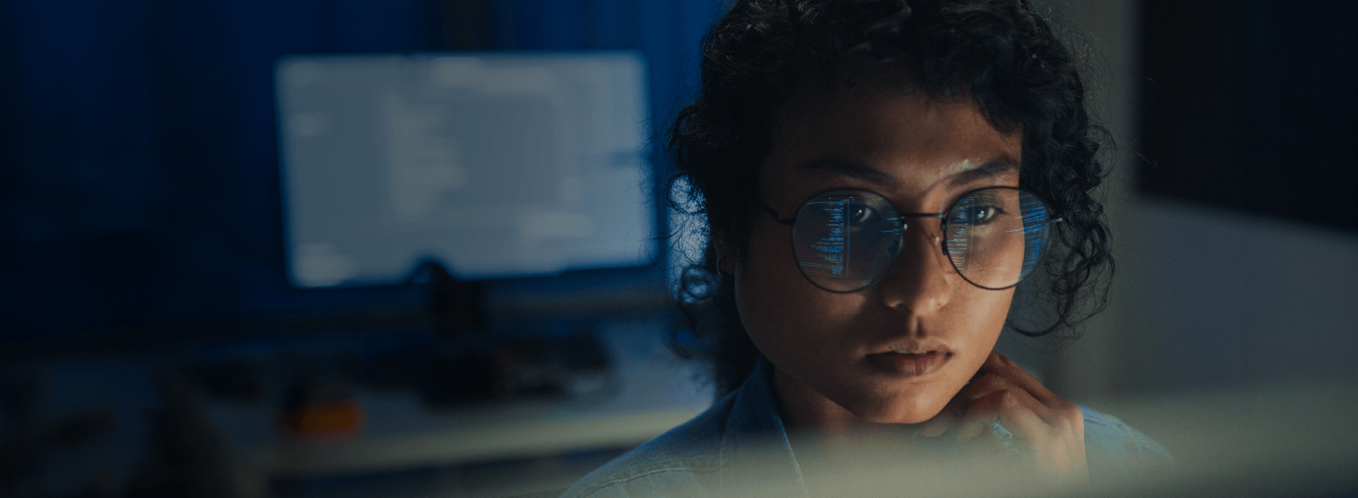 Engineer reviewing deployment options on a monitor