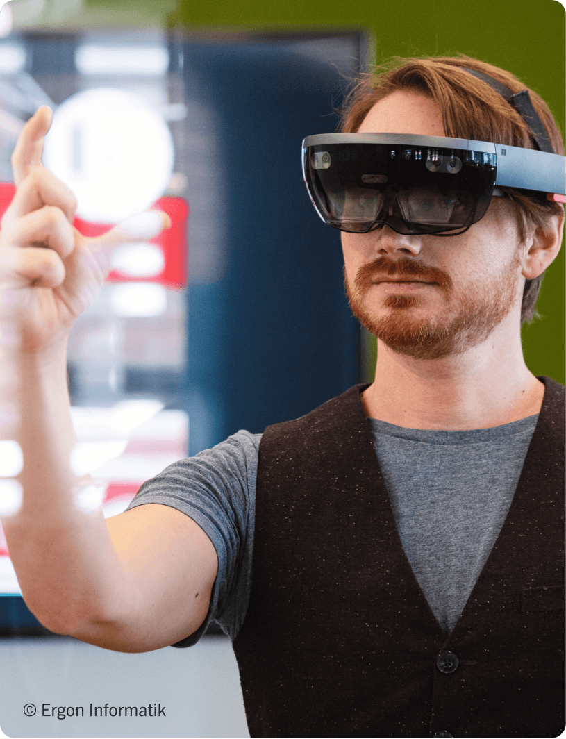 Man in Ergon Informatik headset